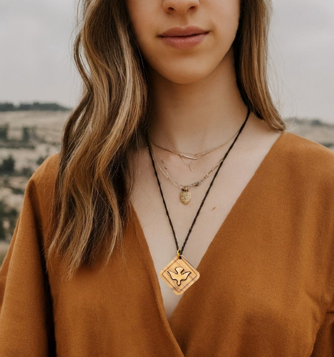 Holy Spirit Dove Pendant made from Olive Wood worn adornment